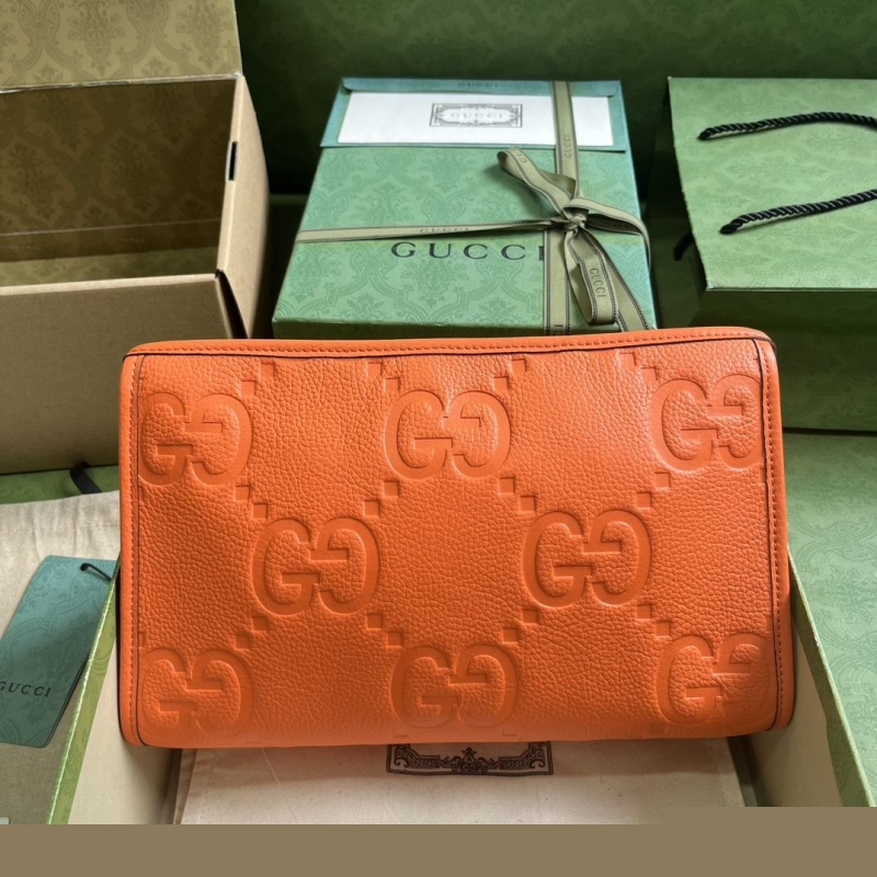 G*u*i clutch bags